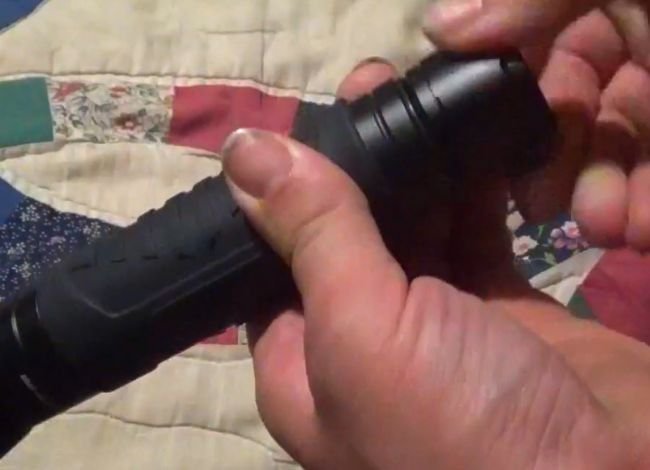 Reattach the top of the flashlight